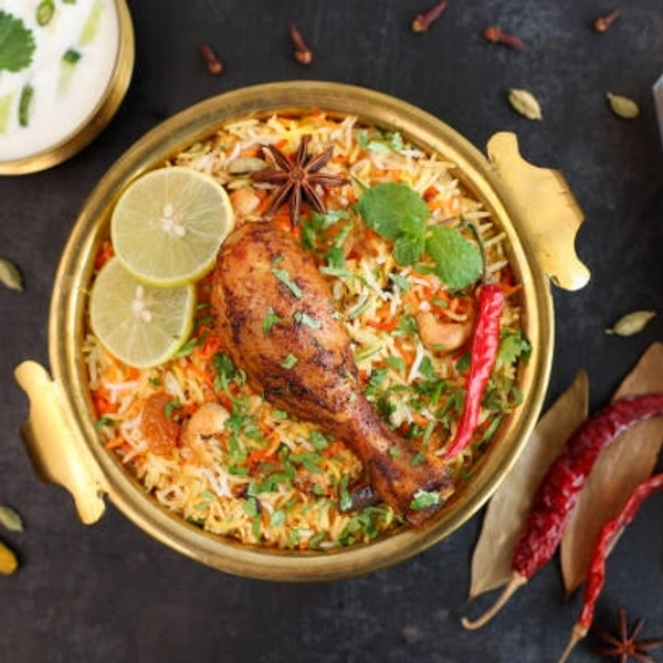 Chicken Biriyani ( Raita + Gravy + Egg )