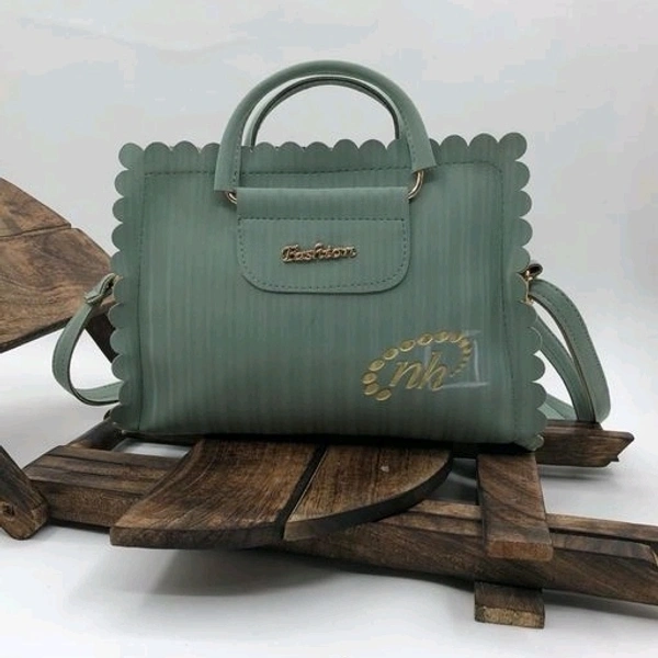 Fancy Sling For Women In Wonderful Design
Material: PUNo. of Compartments: 2