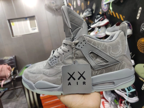 KAWS x Nike Air Jordan 4 - Dove Gray