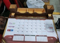 Table organiser with monthly planner