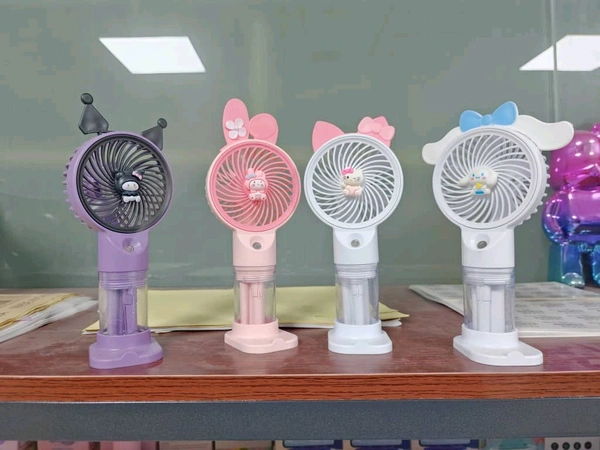 Electric hand fan with mist
