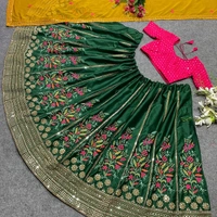 DC-2040 Green Colour Embroidered Attractive Party Wear Silk Lehenga choli has a Regular-fit and is Made From High-Grade Fabrics And Yarn. - FREE