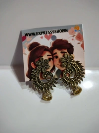 Express Shop  Add a touch of elegance to any occasion with these earrings. ✨#earrings #elegance #style #statementpiece 