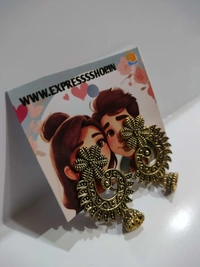 Express Shop  Add a touch of elegance to any occasion with these earrings. ✨#earrings #elegance #style #statementpiece 