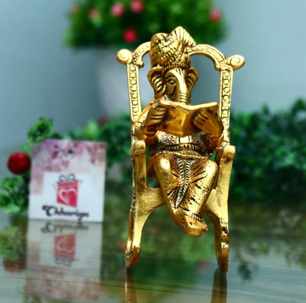 Lord Ganesha Reading Ramayana