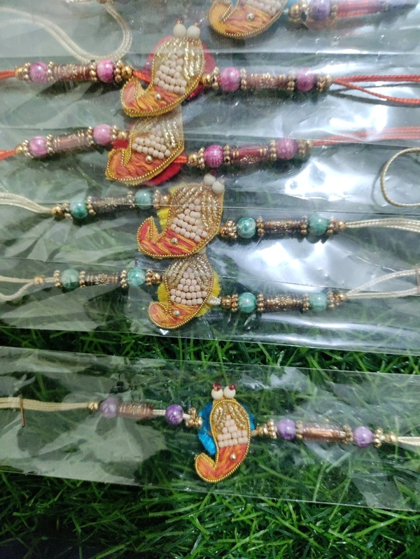 Peacock Shaped Rakhi - Free