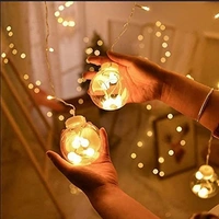 Denizz 12 WISH BALLS WINDOW CURTAIN STRING LIGHTS WITH 8 FLASHING MODES DECORATION FOR HOME DECORATION, DIWALI & WEDDING LED CHRISTMAS LIGHT INDOOR AND OUTDOOR LIGHT ,FESTIVAL DECORATION (PLASTIC, WARM WHITE) - Gold, 8 Feet
