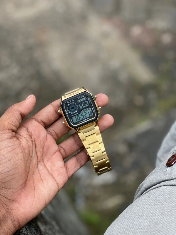Casio World Time  - Gold