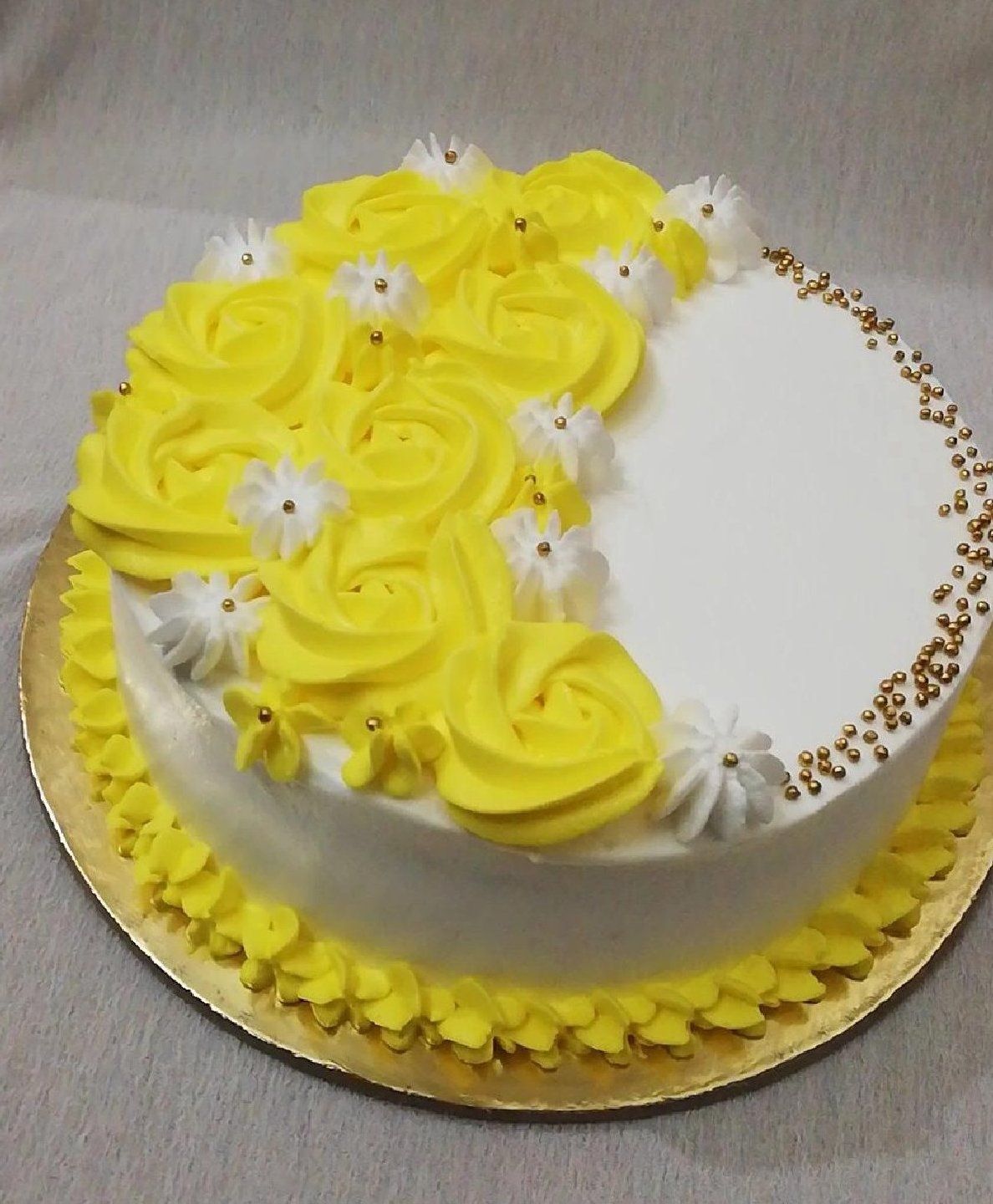 Yellow Cake with Floral Decorations