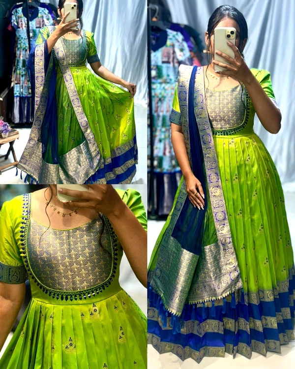 Trendy silk gown, crafted with banarasi silk and golden zari weave.paired with net duppta with zari border and decorated with mirror and work - 2XL