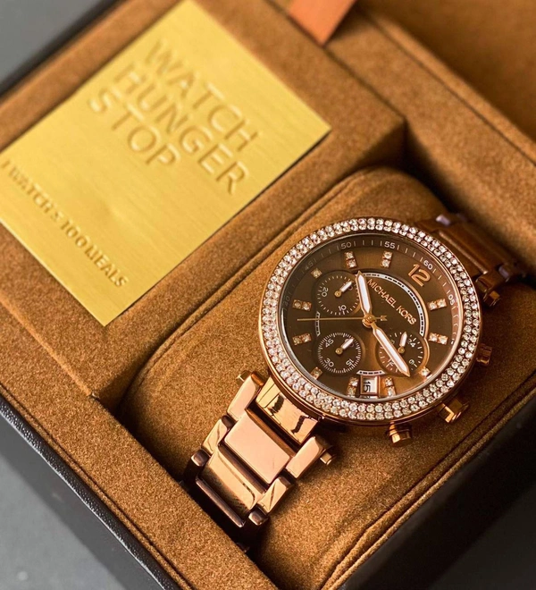 Michael Kore Parker Series  - Web Orange