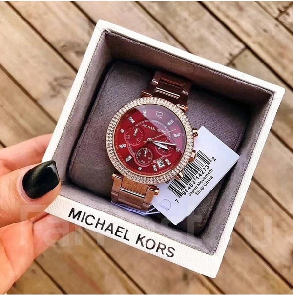 Michael Kore Parker Series  - Red