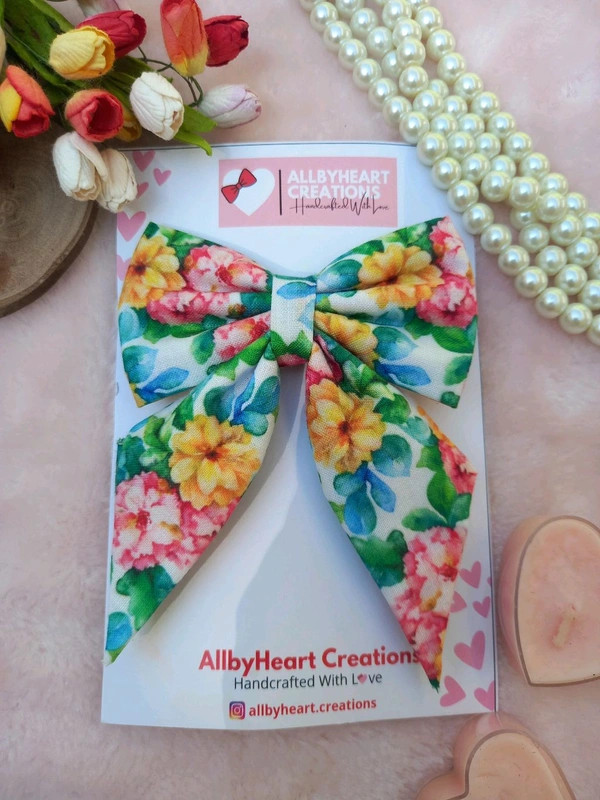 BOLD BEAUTY PIG-TAIL BOW 