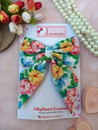 BOLD BEAUTY PIG-TAIL BOW 