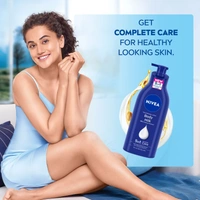 Nivea Nourishing Body Milk Body Lotion 600ml| 5 in one With Deep Moisture Serum, Almond Oil & Vitamin E | 48h Deep Moisture Care | Smooth, Soft Skin All Day | Non Greasy & Healthy Looking Skin | Nourishing milk formula | Deep Nourishment for Dry Skin |