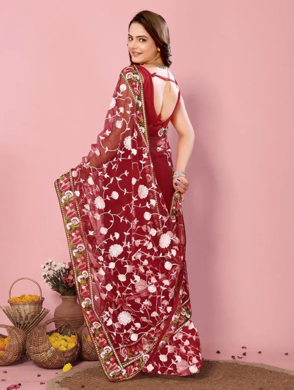 women maroon embroidered saree