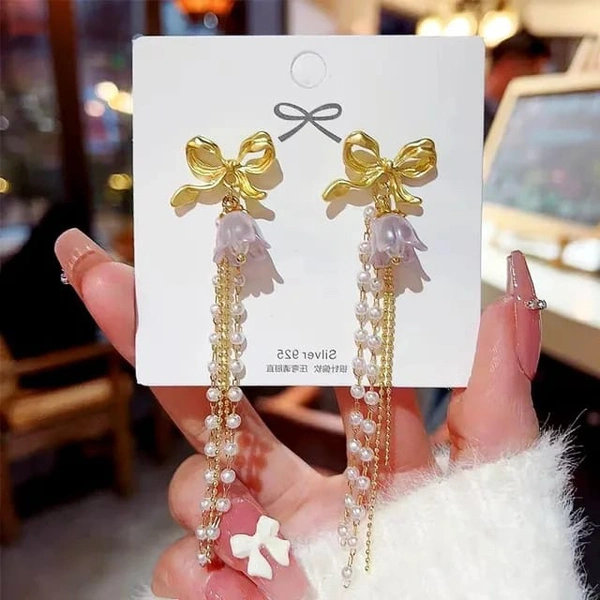 Long Bow Tassel Earrings