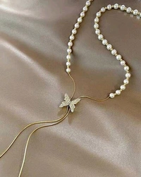 Radiance  Elegant Pearl Bow Drop Necklace