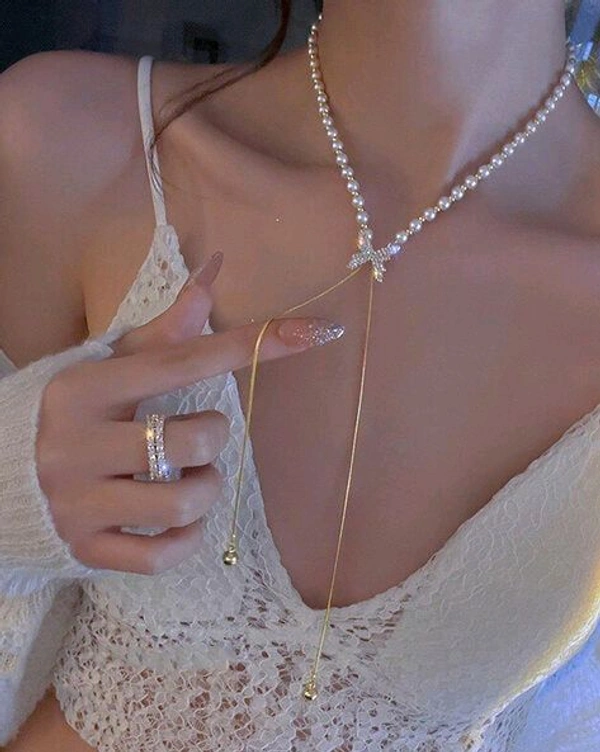 Radiance  Elegant Pearl Bow Drop Necklace