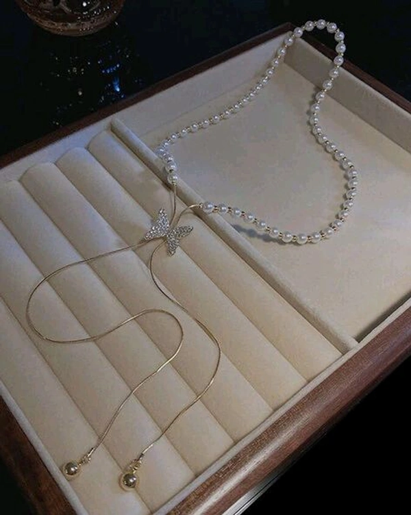 Radiance  Elegant Pearl Bow Drop Necklace