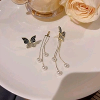 Radiance  Elegant Butterfly Dangle Earrings