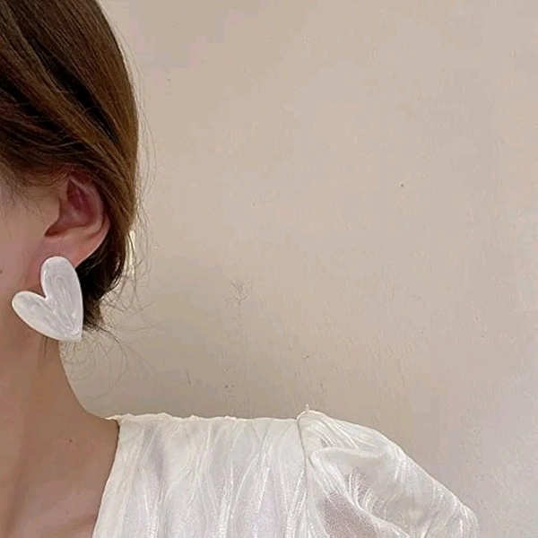Radiance White heart shaped earrings
