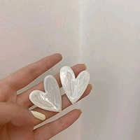 Radiance White heart shaped earrings