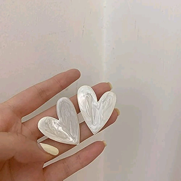 Radiance White heart shaped earrings