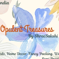 Opulent Treasures by ShreeSakshi-  Raindance•Home  - Logo