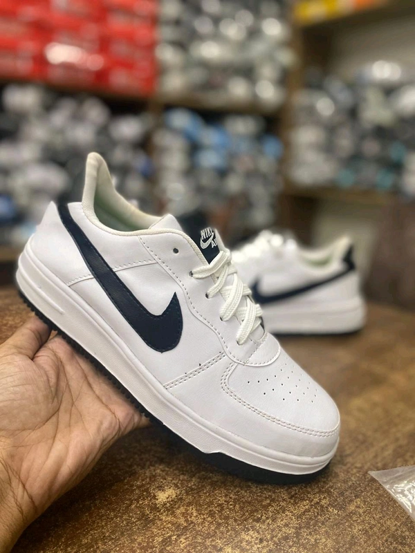 **Nike Classic White Sneakers** - 7
