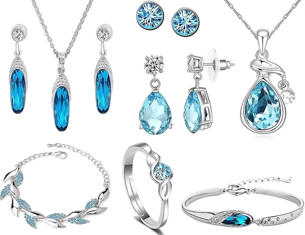 Om Jewells Rhodium Platted Blue Crystal Combo Of Designer Drop Pendant,Tube Pendant Set, Adjustable Solitaire Finger Ring, Solitaire Tops, Bangle Bracelet And Earrings For Girls CO1000319