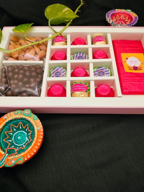 Chocolate Gift Packs Contains 100 Gm Almond,100 Gm Nutties Mini,12 Assorted Chocolate,1 Fruit And Nut Bar
