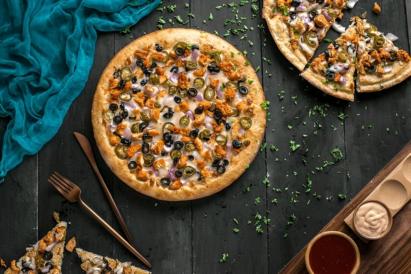 Chicken Supreme
(onion+tomato+olives+jalapeno+spicy chicken+tandoori
chicken)