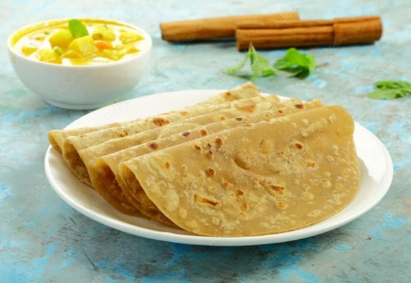 Sri Ganesh Tiffin  Chapati 2 Piece With Curry