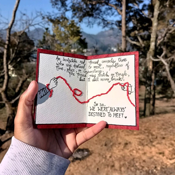 Red Thread Love Card. Has A Chinese Proverb And A Red Stitched Thread.