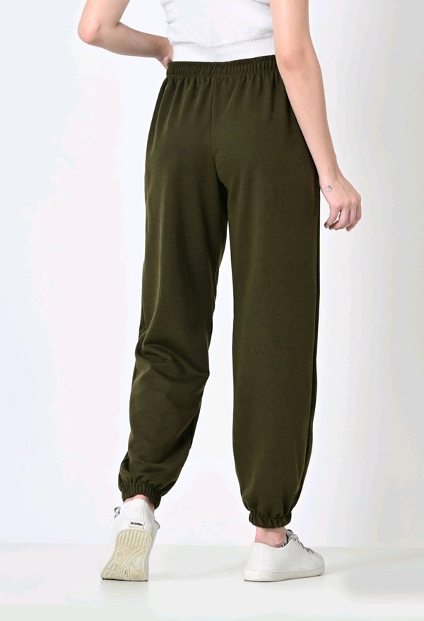 Alza Pack of 2 Women Solid Dark Green, Purple Track Pants - 28