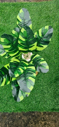 Indian Aesthetica Artificial banana plant with variegated leaves, designed for indoor decoration. 
