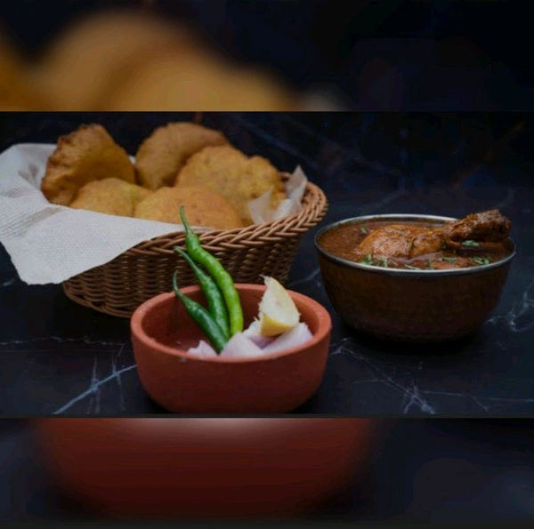 Kombadi Vade (कोंबडी वडे)