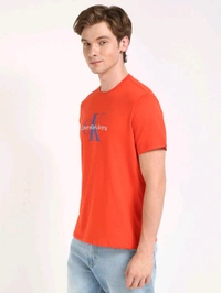CALVIN KLEIN Mens Orange Solid Casual T-Shirt - Red Orange, L