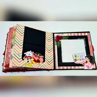 SHIN CHAN SCRAPBOOK  - black,white and red, 7.5x7.5x2 inchs, contain 30 pictures and 10 messages ( extra charges for pics and msgs ) 200/- extra