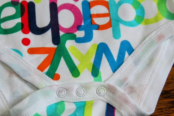 Alphabet Adventure Baby Romper" - 6-9 Month