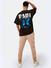 Unleash Your Unique Style with Our Graphic Tee Collection! 🔥

Calling all rappers, gangsters, and streetwear aficionados! It’s time to elevate your wardrobe with our eye-catching Graphic Tee, featuring a captivating blue butterfly design alongside the powerful word “PAIN.” This tee is tailor-made for the bold and fearless youth of 2025!
 - Black, S