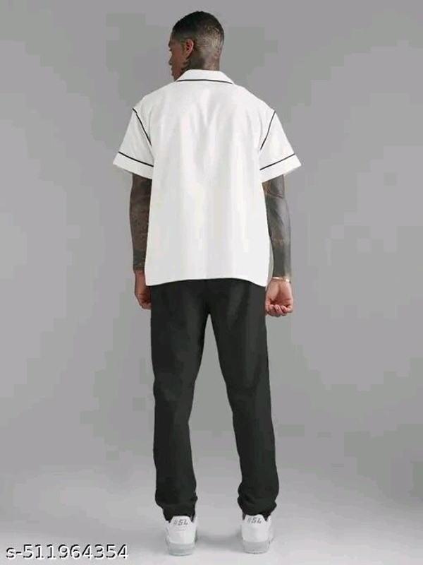 Here’s a unique product name for the outfit:

"Urban Chic Relaxed Fit Ensemble: The Modern Day Lounge Button-Up & Tailored Trouser Set"

 - White, L