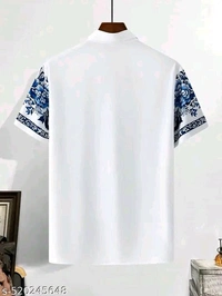 Elysian Floral Elegance ~ This name suggests heavenly beauty and sophistication, perfect for a high-end garment. - White, M