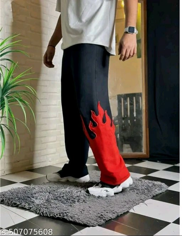 Chic Blaze Trousers ~ 
   Elevate your casual wardrobe with these striking trousers, featuring a unique flame motif that captures attention and exudes confidence - Black, 28