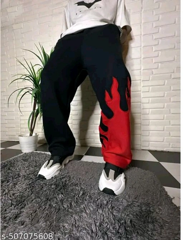 Chic Blaze Trousers ~ 
   Elevate your casual wardrobe with these striking trousers, featuring a unique flame motif that captures attention and exudes confidence - Black, 30