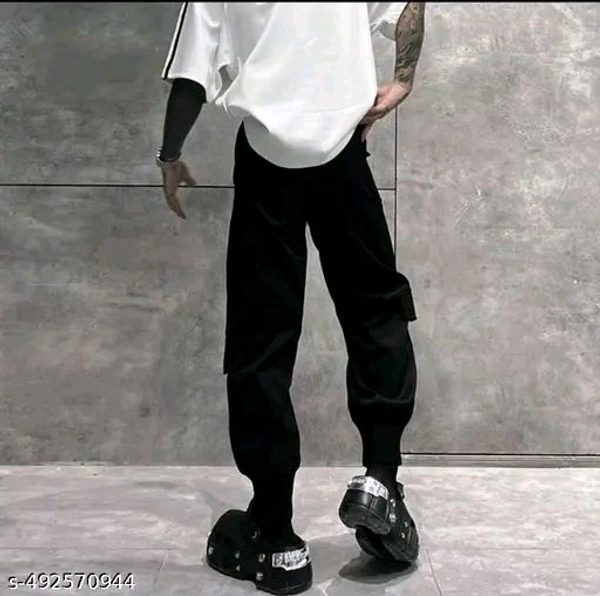 Avant-Garde Utility Pants ~ 
    Step into the future of fashion with these avant-garde pants, designed for those who appreciate unique style and functional elegance in their wardrobe - Black, 34