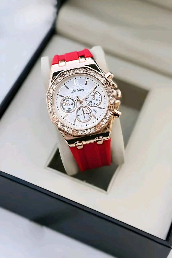 Bolang Luxe Rose Chronograph Watch!!
~ Elevate your style with the Bolang Luxe Rose Chronograph, a perfect blend of elegance and functionality. Featuring a rose gold-tone bezel adorned with sparkling crystals and a vibrant red silicone strap, this watch is designed for those who appreciate bold sophistication.  - Red