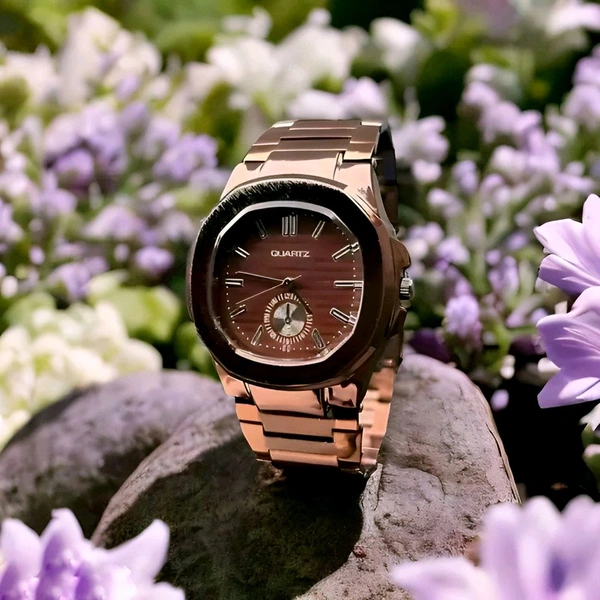 Rose Titan Chronograph Watch
Elevate your wristwear with the Rose Titan Chronograph, a bold fusion of elegance.Crafted with a polished rose gold-tone stainless steel body and featuring a sleek octagonal dial. With detailed minute markers and a stylish sub-dial, it's designed for those who value both precision and fashion. Ideal for formal occasions or upscale everyday wear. - Bourbon