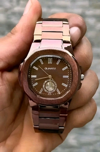 Rose Titan Chronograph Watch
Elevate your wristwear with the Rose Titan Chronograph, a bold fusion of elegance.Crafted with a polished rose gold-tone stainless steel body and featuring a sleek octagonal dial. With detailed minute markers and a stylish sub-dial, it's designed for those who value both precision and fashion. Ideal for formal occasions or upscale everyday wear. - Bourbon